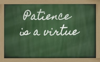 Expression - Patience is a virtue - written on a school blackbo clipart