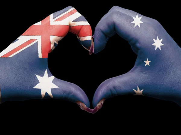 Heart and love gesture by hands colored in australia flag for t — Stock Photo, Image
