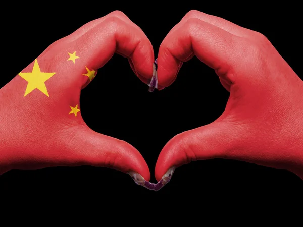 在莱的中国国旗色的心和爱的姿态的手 — 图库照片