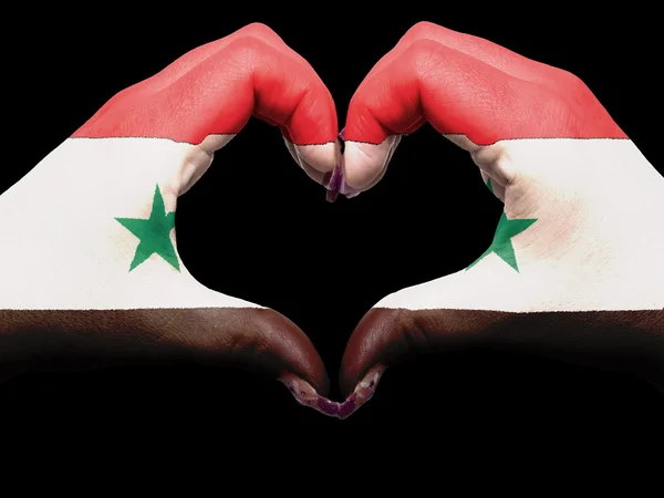 Coração e gesto de amor por mãos coloridas na bandeira do Iraque para touris — Fotografia de Stock