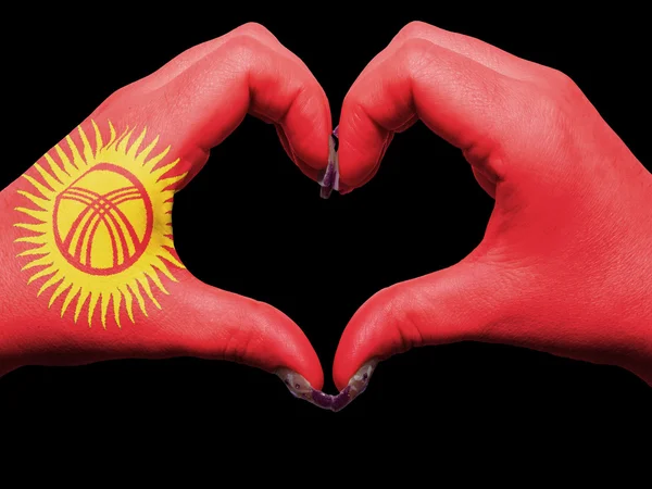 Hjärta och kärlek gest av händer färgade i Kirgizistan för touris — Stockfoto