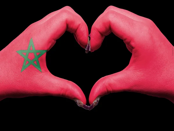 Καρδιά και αγάπη χειρονομία από χέρια χρωματισμένη με σημαία του Μαρόκου — Φωτογραφία Αρχείου