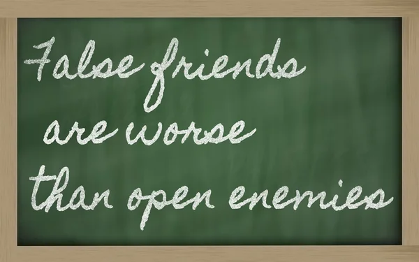 Uttryck - falska vänner är värre än öppen fiender - skriven — Stockfoto