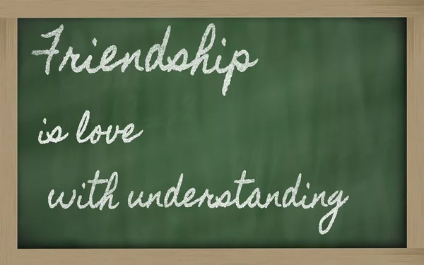 Wyrażenie - przyjaźń jest miłość ze zrozumieniem - napisane na — Zdjęcie stockowe