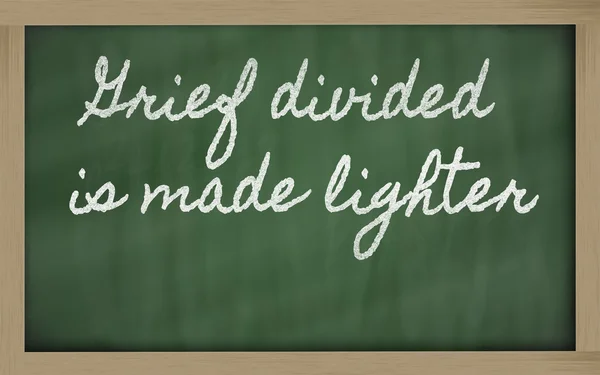 Expression - Grief divided is made lighter - written on a schoo — Stock Photo, Image