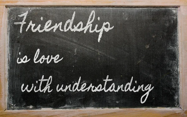 Expression - L'amitié est l'amour avec la compréhension - écrit sur — Photo