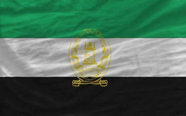 Komplett geschwenkte Nationalflagge Afghanistans als Hintergrund — Stockfoto