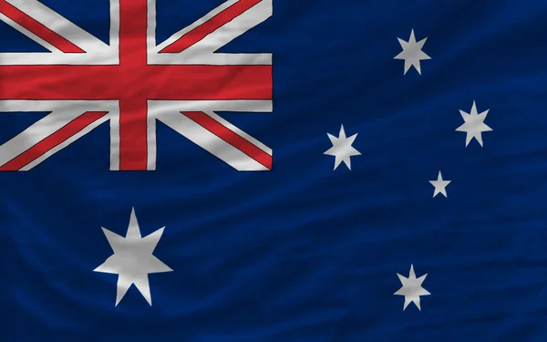 Полный размахивал национальным флагом Австралии на заднем плане — стоковое фото