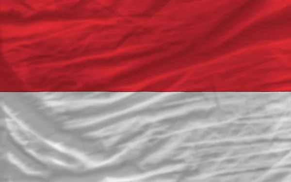 Komplett geschwenkte Nationalflagge Indonesiens als Hintergrund — Stockfoto