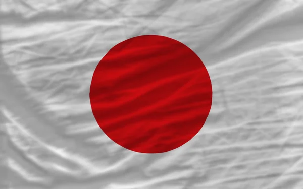 Komplett geschwenkte Nationalflagge Japans als Hintergrund — Stockfoto