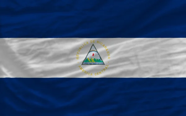 Komplett geschwenkte Nationalflagge Nicaraguas als Hintergrund — Stockfoto