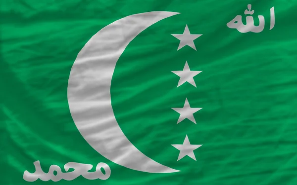 Wave nationale vlag van Comoren voor achtergrond voltooien — Stockfoto