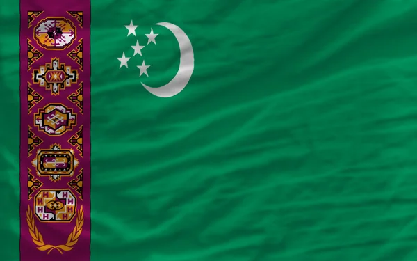 Kompletní zamával státní vlajka Turkmenistánu na pozadí — Stock fotografie