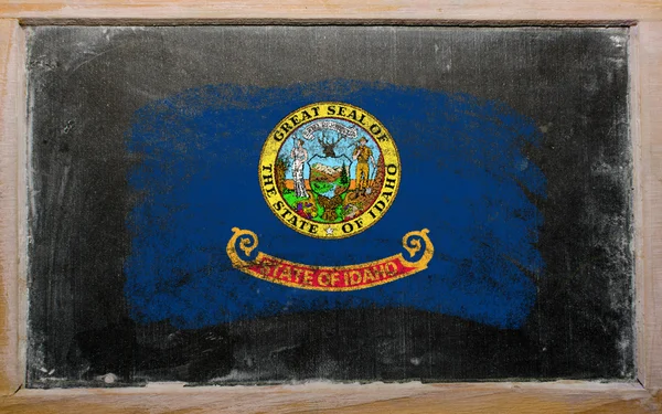 Flag of US state of idaho on blackboard painted with chalk — Stock Photo, Image