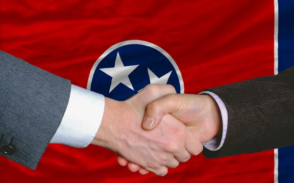 In front of american state flag of tennessee two businessmen han — Stock Photo, Image