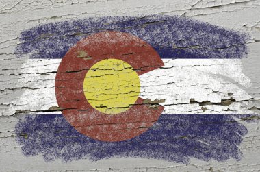 Flag of US state of colorado on grunge wooden texture precise pa clipart