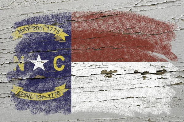 Flag of US state of north carolina on grunge wooden texture prec — Stock Photo, Image