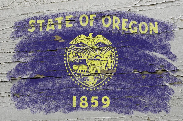 Flagge von uns Staat Oregon auf Grunge hölzerne Textur präzise Schmerzen — Stockfoto
