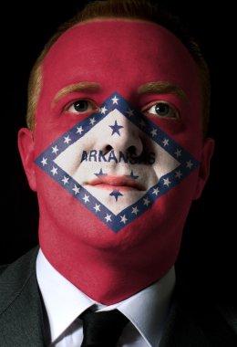 Us state of arkansas flag painted face of businessman or politic clipart