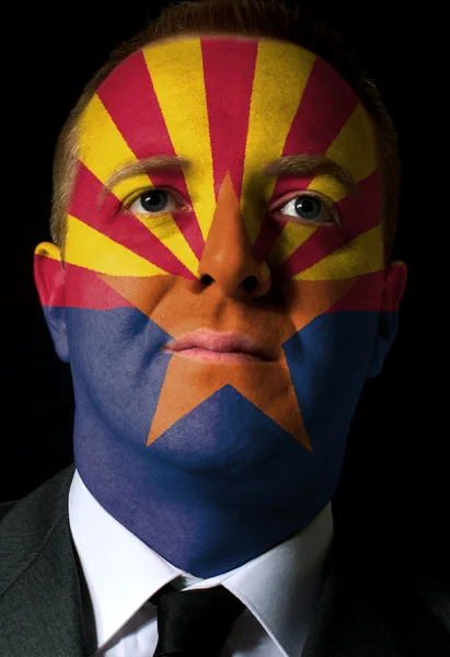 Us state of arizona flag painted face of businessman or politici — Stock Photo, Image