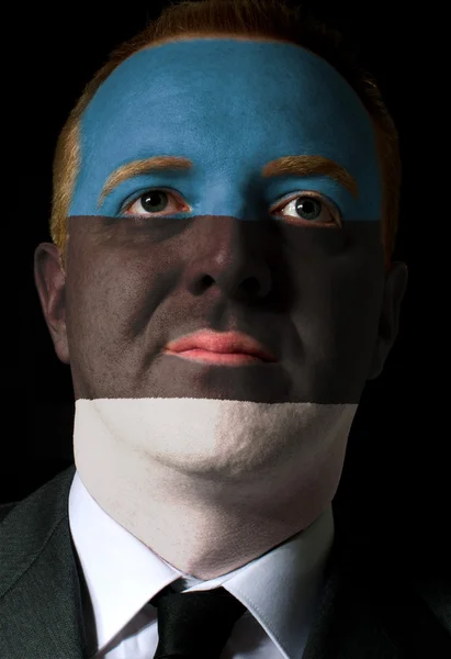 Πρόσωπο της σοβαροί επιχειρηματία ή πολιτικός που χρωματίζονται στα χρώματα της ε — Φωτογραφία Αρχείου