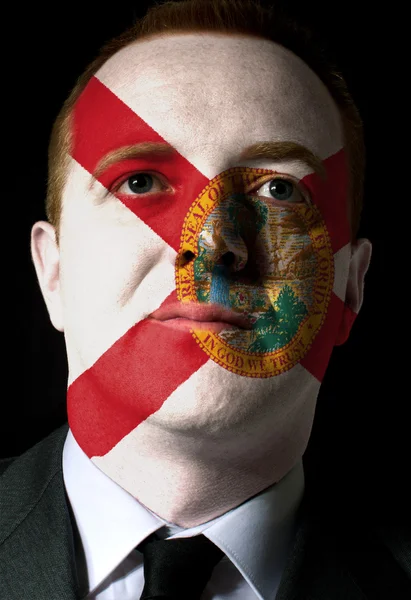Oss delstaten florida flagga målade ansiktet affärsman eller politici — Stockfoto
