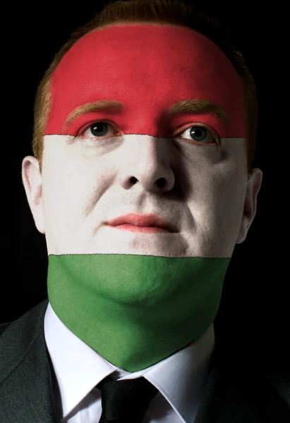 Rostro de empresario serio o político pintado en colores de h — Foto de Stock