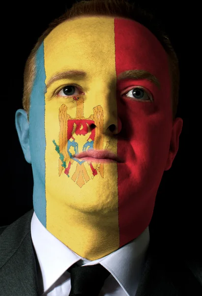 Rosto de empresário sério ou político pintado em cores de m — Fotografia de Stock