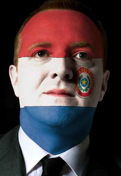 Gesicht eines seriösen Geschäftsmannes oder Politikers in den Farben von p — Stockfoto