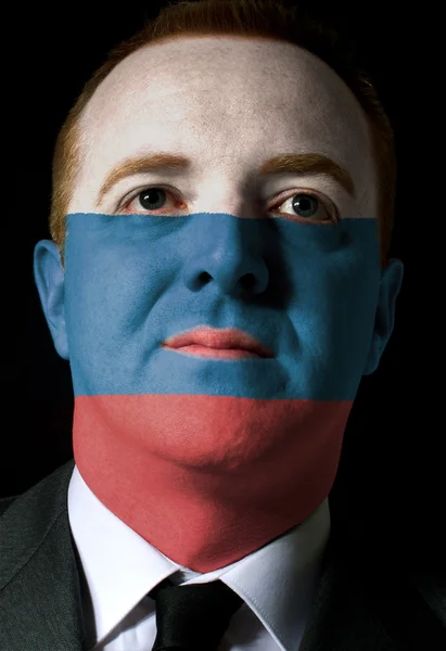 R の色で塗られて深刻なビジネスマンや政治家の顔 — ストック写真