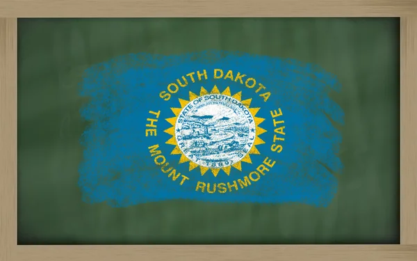 Flag of us state of south dakota on blackboard painted with chal — Stock Photo, Image
