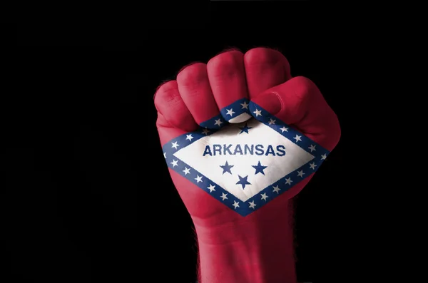 拳头绘在我们阿肯色州旗的颜色 — 图库照片