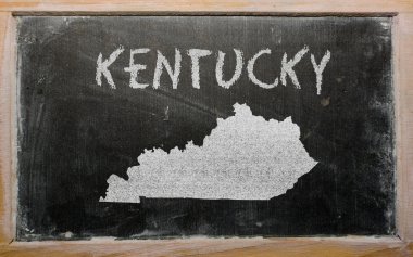 Outline map of us state of kentucky on blackboard clipart