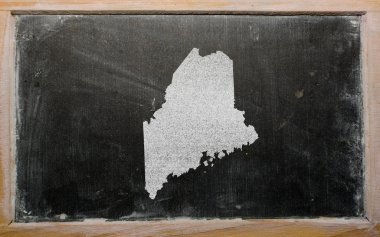 Outline map of us state of maine on blackboard clipart