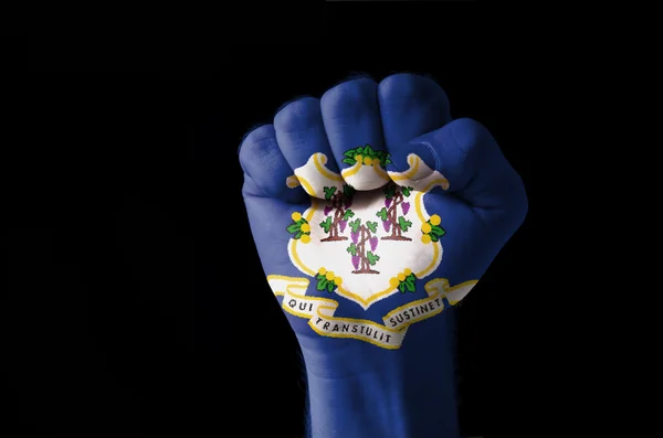 Fist painted in colors of us state of connecticut flag — Stock Photo, Image