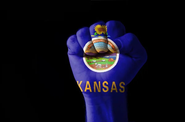 Fist painted in colors of us state of kansas flag — Stock Photo, Image