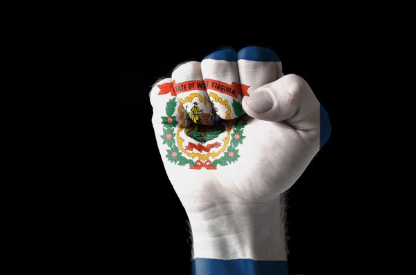 Fist painted in colors of us state of west virginia flag — Stock Photo, Image