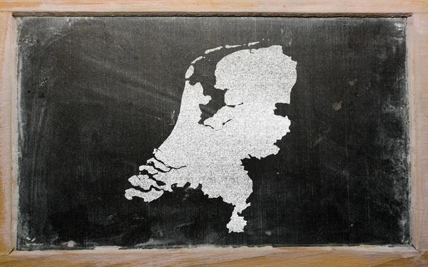 Outline map of netherlands on blackboard — Stock Photo, Image
