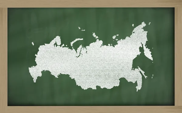 Outline map of russia on blackboard — Stock Photo, Image