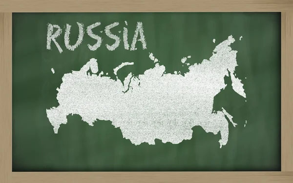 Outline map of russia on blackboard — Stock Photo, Image