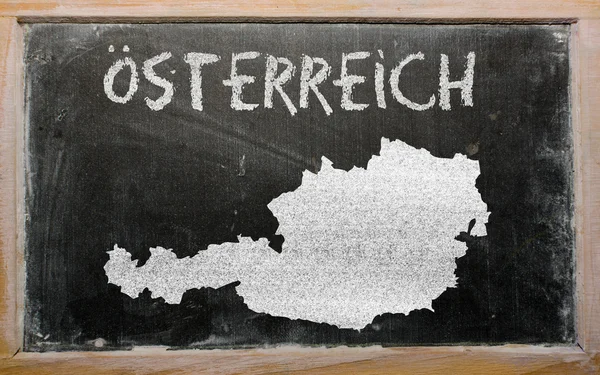Outline map of austria on blackboard — Stock Photo, Image