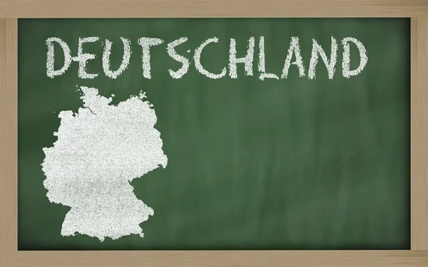 stock image Outline map of germany on blackboard