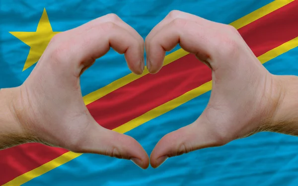 Nad vlajka Konga ukázala srdce a lásku gesto ze strany rukou — Stock fotografie