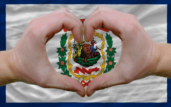 Over american state flag of west virginia showed heart and love — Stock Photo, Image