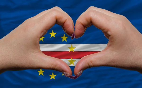 Over flag of cape verde showed heart and love gesture made by ha — Stock Photo, Image