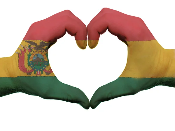 Жест любви и сердца в цветах флага Боливии руками изолированными — стоковое фото