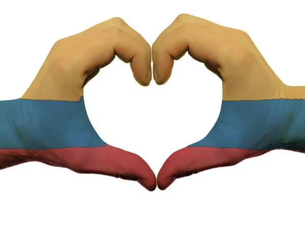 Cœur et geste d'amour dans les couleurs du drapeau colombien par les mains isolées — Photo