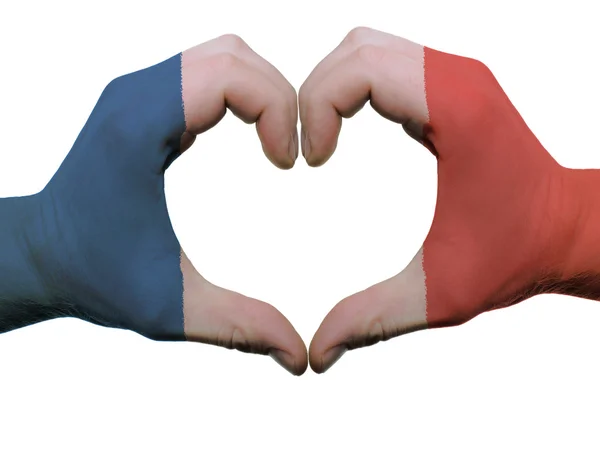 Herz- und Liebesgeste in den Farben der französischen Flagge durch die Hände isoliert o — Stockfoto