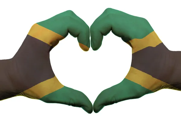 Heart and love gesture in jamaica flag colors by hands isolated — Stock Photo, Image