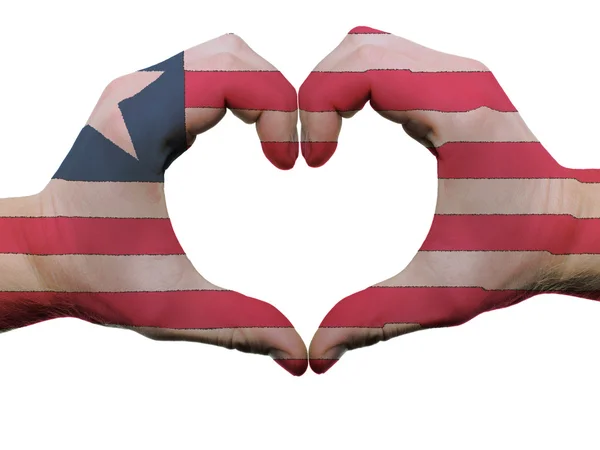 Corazón y gesto de amor en colores de bandera de Liberia por manos aisladas —  Fotos de Stock
